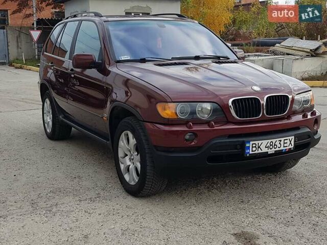 Красный БМВ Х5, объемом двигателя 2.93 л и пробегом 395 тыс. км за 7750 $, фото 7 на Automoto.ua