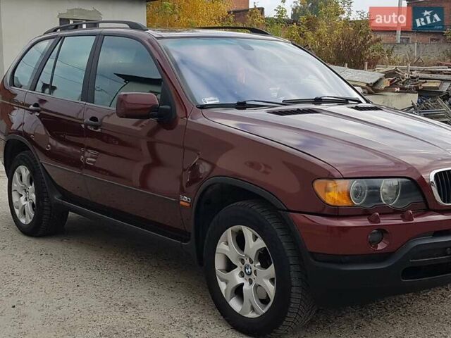 Красный БМВ Х5, объемом двигателя 2.93 л и пробегом 395 тыс. км за 7750 $, фото 21 на Automoto.ua