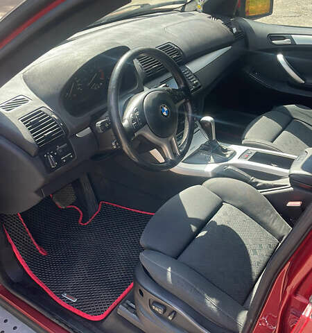 Красный БМВ Х5, объемом двигателя 3 л и пробегом 331 тыс. км за 7600 $, фото 8 на Automoto.ua