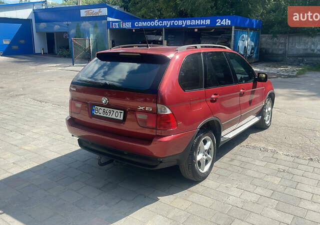 Красный БМВ Х5, объемом двигателя 3 л и пробегом 331 тыс. км за 8100 $, фото 3 на Automoto.ua