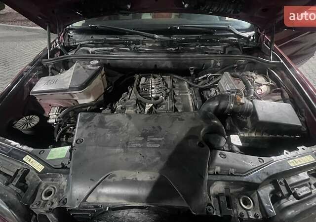 Красный БМВ Х5, объемом двигателя 3 л и пробегом 340 тыс. км за 6500 $, фото 17 на Automoto.ua