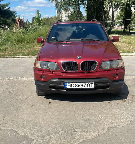 Красный БМВ Х5, объемом двигателя 3 л и пробегом 331 тыс. км за 8100 $, фото 1 на Automoto.ua