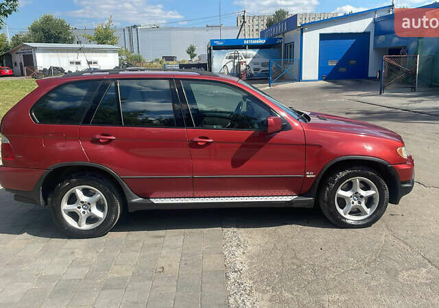 Красный БМВ Х5, объемом двигателя 3 л и пробегом 331 тыс. км за 8100 $, фото 2 на Automoto.ua