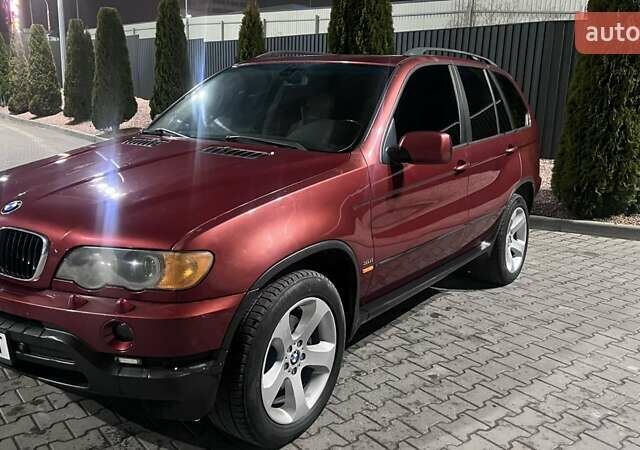 Красный БМВ Х5, объемом двигателя 3 л и пробегом 340 тыс. км за 6500 $, фото 3 на Automoto.ua