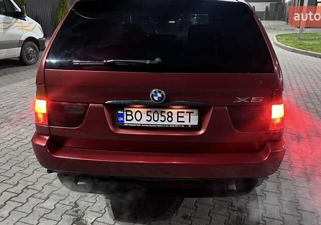Красный БМВ Х5, объемом двигателя 3 л и пробегом 340 тыс. км за 6500 $, фото 9 на Automoto.ua