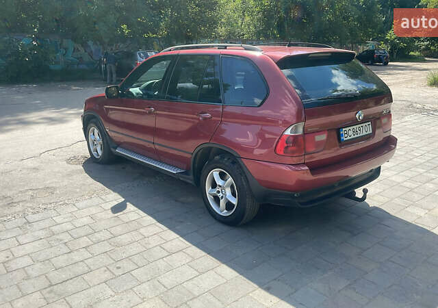 Красный БМВ Х5, объемом двигателя 3 л и пробегом 331 тыс. км за 8100 $, фото 5 на Automoto.ua