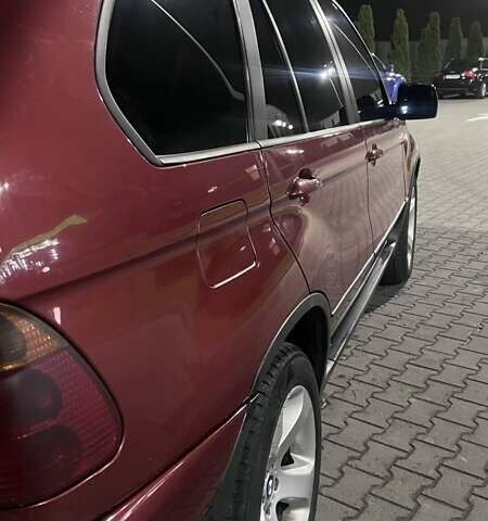 Красный БМВ Х5, объемом двигателя 3 л и пробегом 340 тыс. км за 6500 $, фото 5 на Automoto.ua