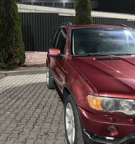 Красный БМВ Х5, объемом двигателя 3 л и пробегом 340 тыс. км за 6500 $, фото 6 на Automoto.ua