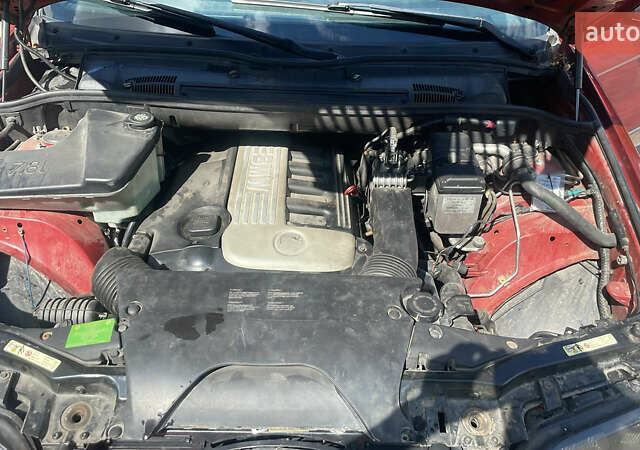 Красный БМВ Х5, объемом двигателя 3 л и пробегом 331 тыс. км за 7600 $, фото 13 на Automoto.ua