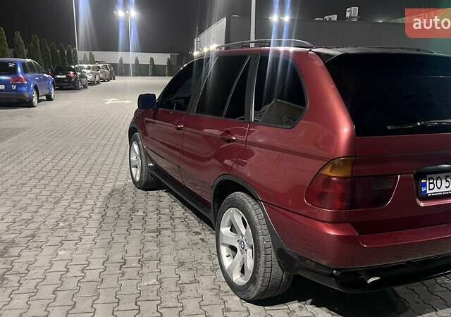 Красный БМВ Х5, объемом двигателя 3 л и пробегом 340 тыс. км за 6500 $, фото 4 на Automoto.ua