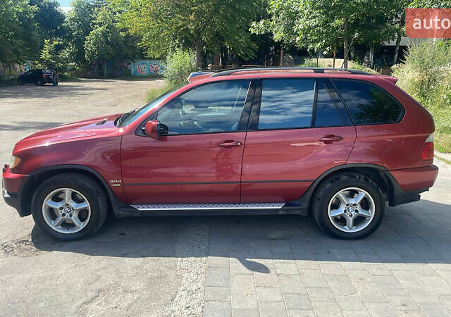 Красный БМВ Х5, объемом двигателя 3 л и пробегом 331 тыс. км за 7600 $, фото 6 на Automoto.ua