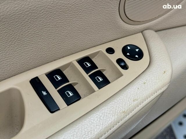 Красный БМВ Х5, объемом двигателя 3 л и пробегом 309 тыс. км за 12390 $, фото 12 на Automoto.ua