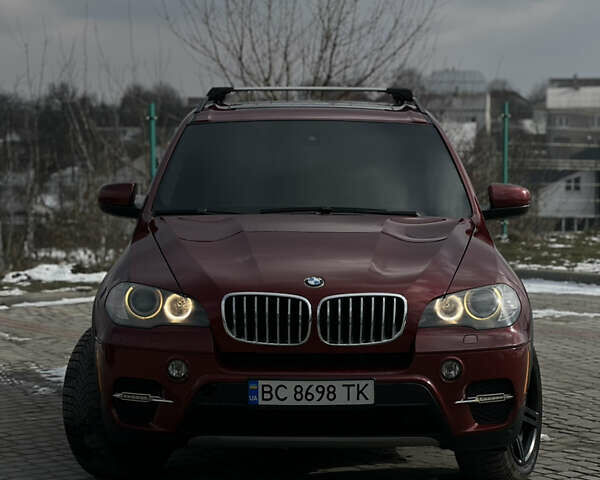 Красный БМВ Х5, объемом двигателя 3 л и пробегом 194 тыс. км за 10999 $, фото 1 на Automoto.ua