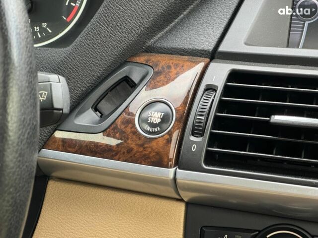 Красный БМВ Х5, объемом двигателя 3 л и пробегом 309 тыс. км за 12390 $, фото 33 на Automoto.ua