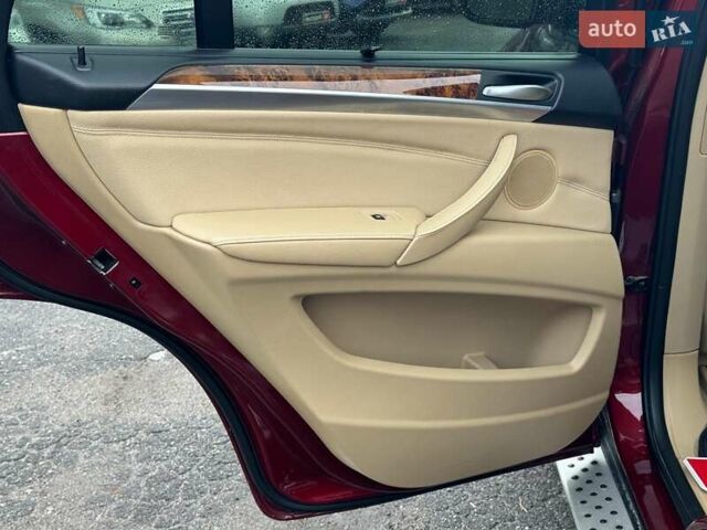 Красный БМВ Х5, объемом двигателя 3 л и пробегом 309 тыс. км за 12390 $, фото 16 на Automoto.ua