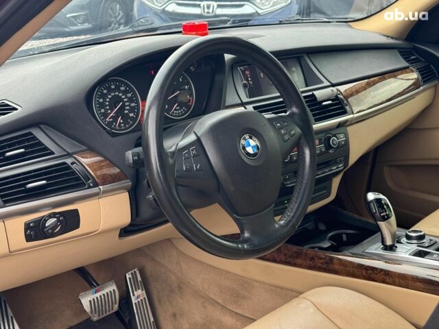 Красный БМВ Х5, объемом двигателя 3 л и пробегом 309 тыс. км за 12390 $, фото 15 на Automoto.ua