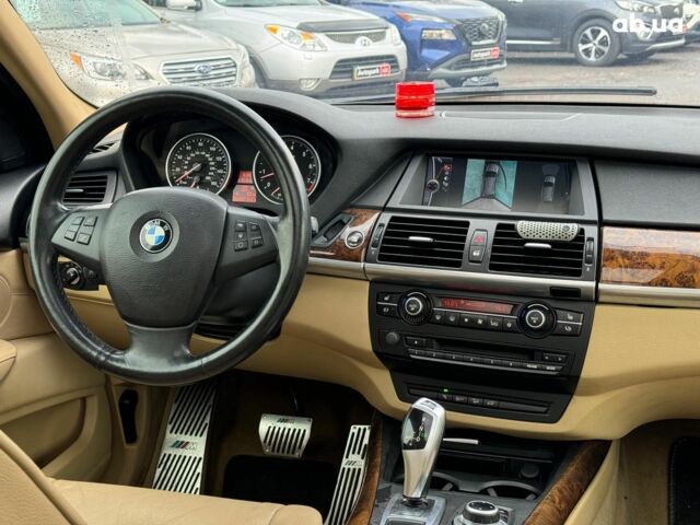 Красный БМВ Х5, объемом двигателя 3 л и пробегом 309 тыс. км за 12390 $, фото 27 на Automoto.ua