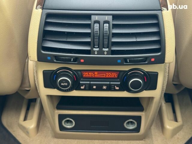 Красный БМВ Х5, объемом двигателя 3 л и пробегом 309 тыс. км за 12390 $, фото 26 на Automoto.ua