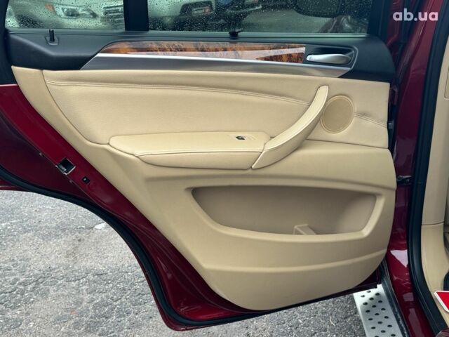 Красный БМВ Х5, объемом двигателя 3 л и пробегом 309 тыс. км за 12390 $, фото 16 на Automoto.ua