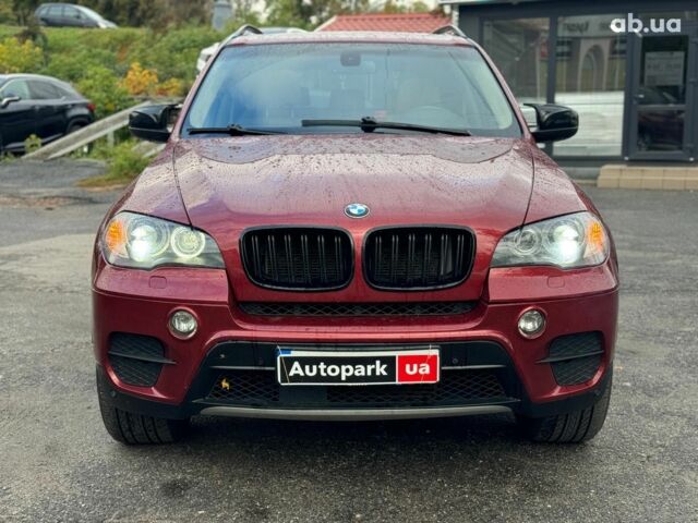 Красный БМВ Х5, объемом двигателя 3 л и пробегом 309 тыс. км за 12390 $, фото 1 на Automoto.ua