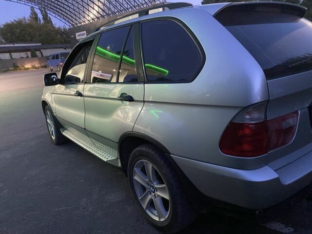 Серый БМВ Х5, объемом двигателя 3 л и пробегом 247 тыс. км за 7800 $, фото 1 на Automoto.ua