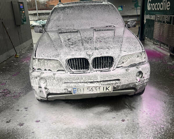 Серый БМВ Х5, объемом двигателя 4.4 л и пробегом 269 тыс. км за 6700 $, фото 7 на Automoto.ua