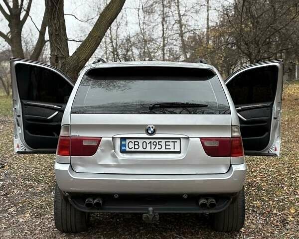 Серый БМВ Х5, объемом двигателя 4.4 л и пробегом 451 тыс. км за 6000 $, фото 5 на Automoto.ua