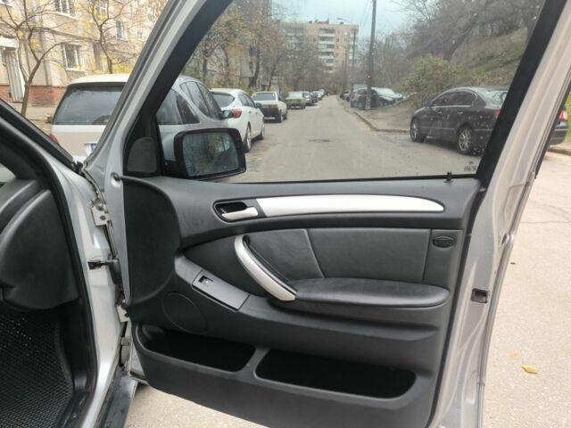 Серый БМВ Х5, объемом двигателя 2.9 л и пробегом 440 тыс. км за 9100 $, фото 6 на Automoto.ua