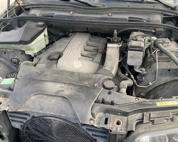 Серый БМВ Х5, объемом двигателя 3 л и пробегом 400 тыс. км за 10300 $, фото 9 на Automoto.ua