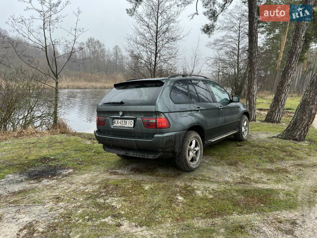 Серый БМВ Х5, объемом двигателя 2.93 л и пробегом 450 тыс. км за 10000 $, фото 3 на Automoto.ua