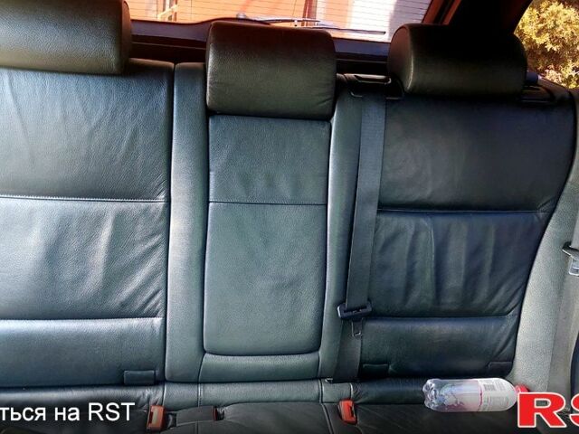 Серый БМВ Х5, объемом двигателя 3 л и пробегом 690 тыс. км за 9000 $, фото 6 на Automoto.ua