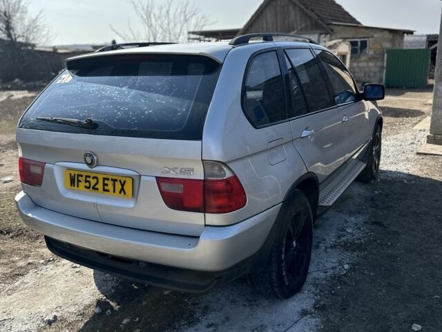 Серый БМВ Х5, объемом двигателя 3 л и пробегом 250 тыс. км за 4500 $, фото 3 на Automoto.ua