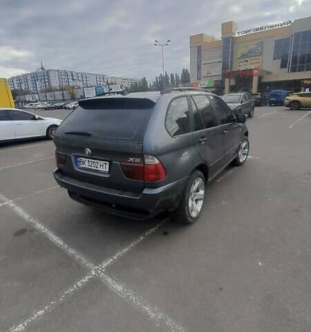 Серый БМВ Х5, объемом двигателя 2.93 л и пробегом 400 тыс. км за 8900 $, фото 6 на Automoto.ua