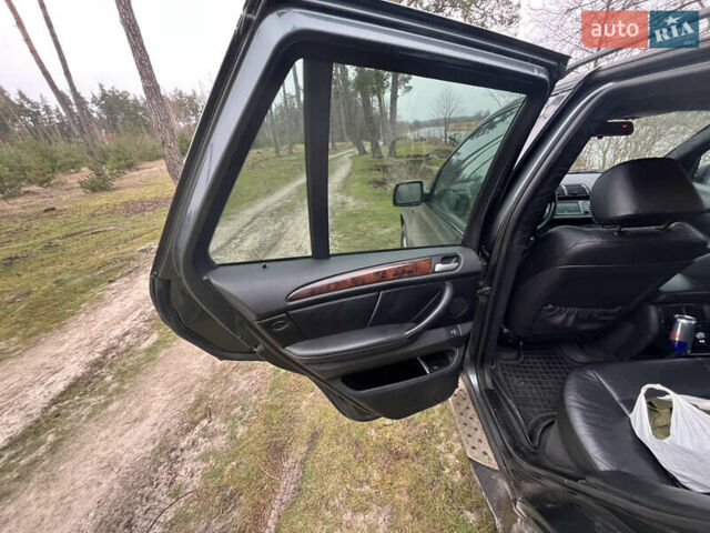 Серый БМВ Х5, объемом двигателя 2.93 л и пробегом 450 тыс. км за 10000 $, фото 26 на Automoto.ua