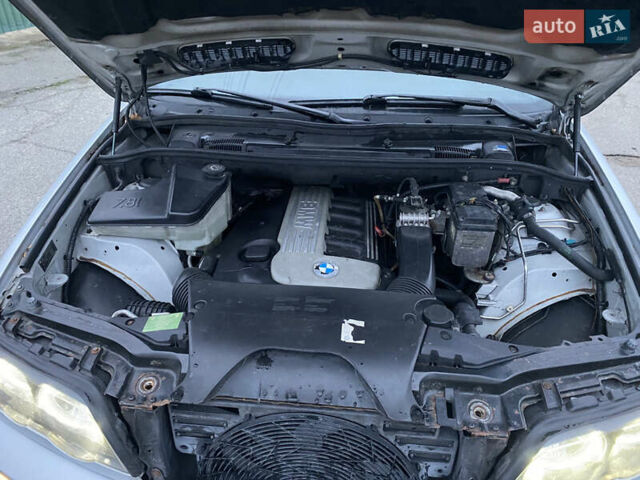 Серый БМВ Х5, объемом двигателя 3 л и пробегом 330 тыс. км за 4799 $, фото 26 на Automoto.ua