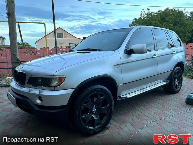 Серый БМВ Х5, объемом двигателя 3 л и пробегом 345 тыс. км за 11200 $, фото 2 на Automoto.ua