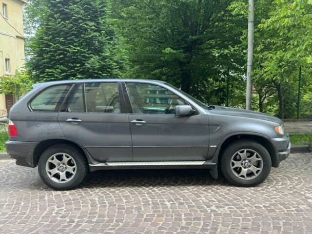 Серый БМВ Х5, объемом двигателя 3 л и пробегом 431 тыс. км за 5000 $, фото 5 на Automoto.ua