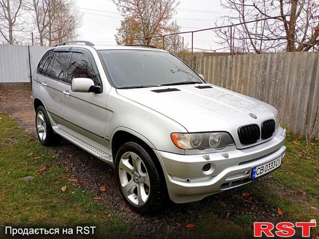 Серый БМВ Х5, объемом двигателя 3 л и пробегом 300 тыс. км за 8000 $, фото 1 на Automoto.ua