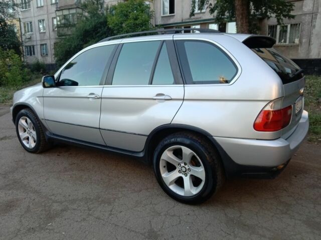 Серый БМВ Х5, объемом двигателя 4.4 л и пробегом 400 тыс. км за 6500 $, фото 2 на Automoto.ua
