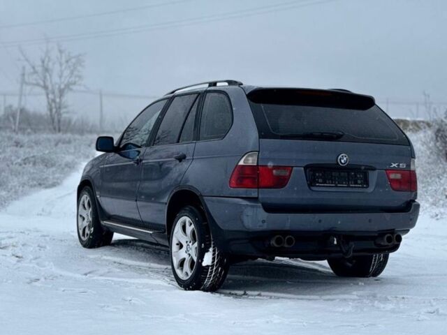 Серый БМВ Х5, объемом двигателя 3 л и пробегом 300 тыс. км за 6000 $, фото 4 на Automoto.ua