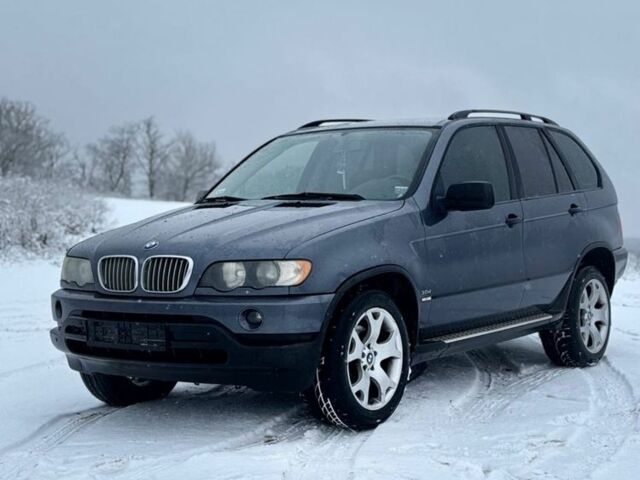 Серый БМВ Х5, объемом двигателя 3 л и пробегом 300 тыс. км за 6000 $, фото 1 на Automoto.ua