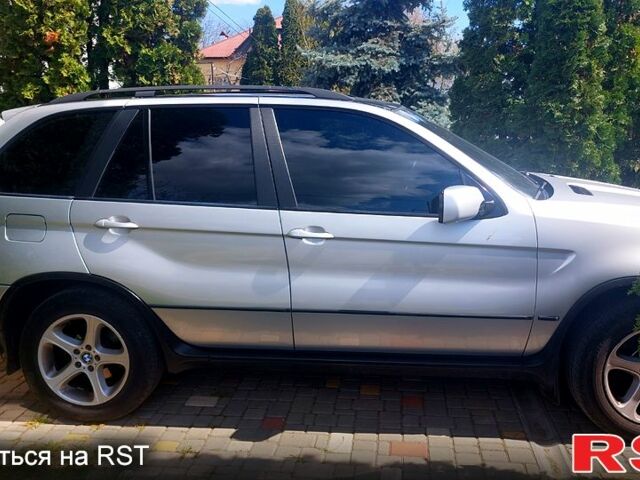 Серый БМВ Х5, объемом двигателя 3 л и пробегом 690 тыс. км за 9000 $, фото 3 на Automoto.ua