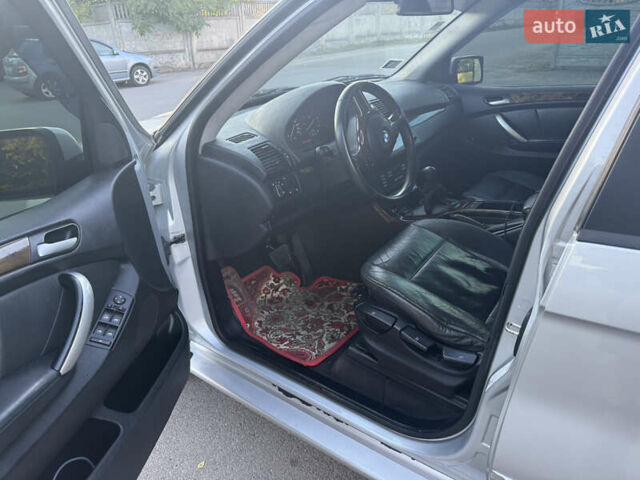 Серый БМВ Х5, объемом двигателя 3 л и пробегом 440 тыс. км за 8200 $, фото 4 на Automoto.ua