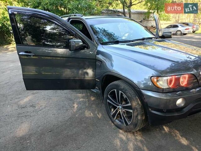 Сірий БМВ Х5, об'ємом двигуна 3 л та пробігом 400 тис. км за 11000 $, фото 5 на Automoto.ua