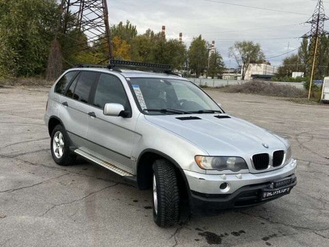 Серый БМВ Х5, объемом двигателя 3 л и пробегом 390 тыс. км за 5500 $, фото 1 на Automoto.ua
