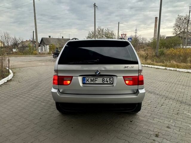 Серый БМВ Х5, объемом двигателя 3 л и пробегом 300 тыс. км за 5400 $, фото 4 на Automoto.ua