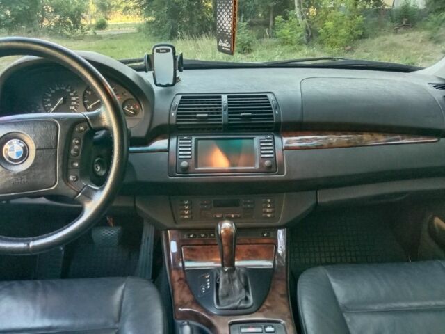 Серый БМВ Х5, объемом двигателя 4.4 л и пробегом 400 тыс. км за 6500 $, фото 4 на Automoto.ua