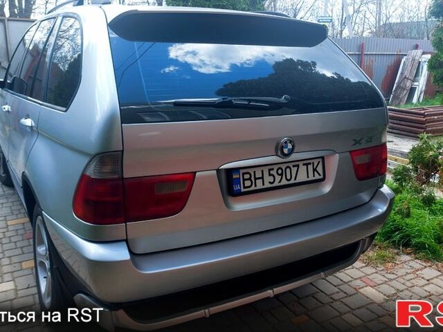 Серый БМВ Х5, объемом двигателя 3 л и пробегом 690 тыс. км за 9000 $, фото 1 на Automoto.ua