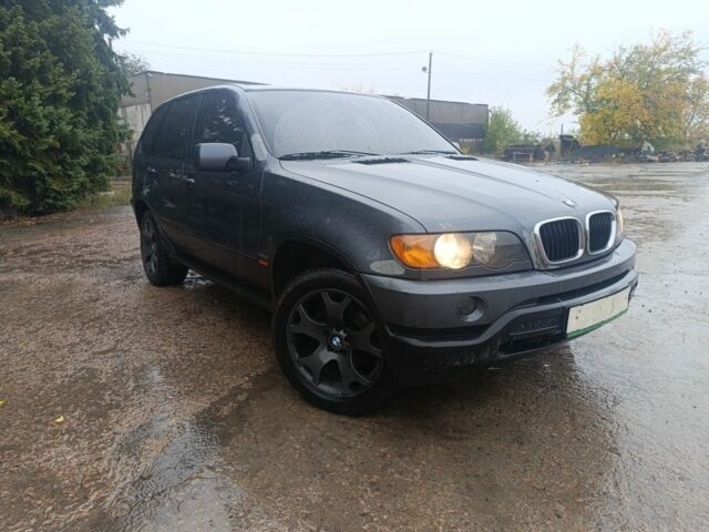 Серый БМВ Х5, объемом двигателя 3 л и пробегом 300 тыс. км за 4700 $, фото 1 на Automoto.ua