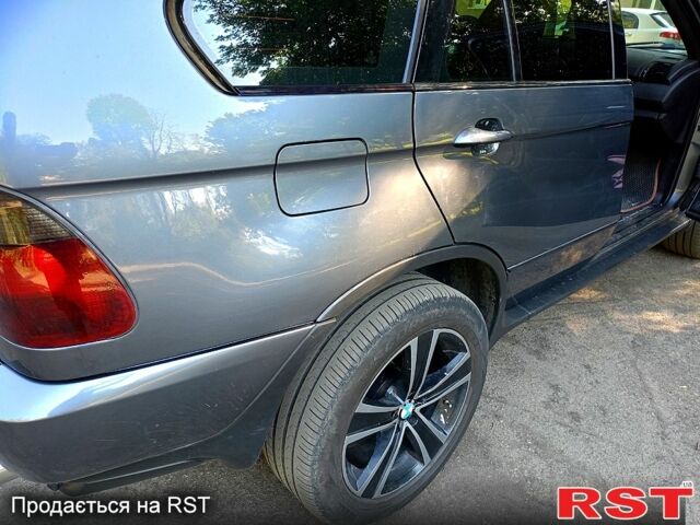 Серый БМВ Х5, объемом двигателя 2.9 л и пробегом 420 тыс. км за 7000 $, фото 5 на Automoto.ua